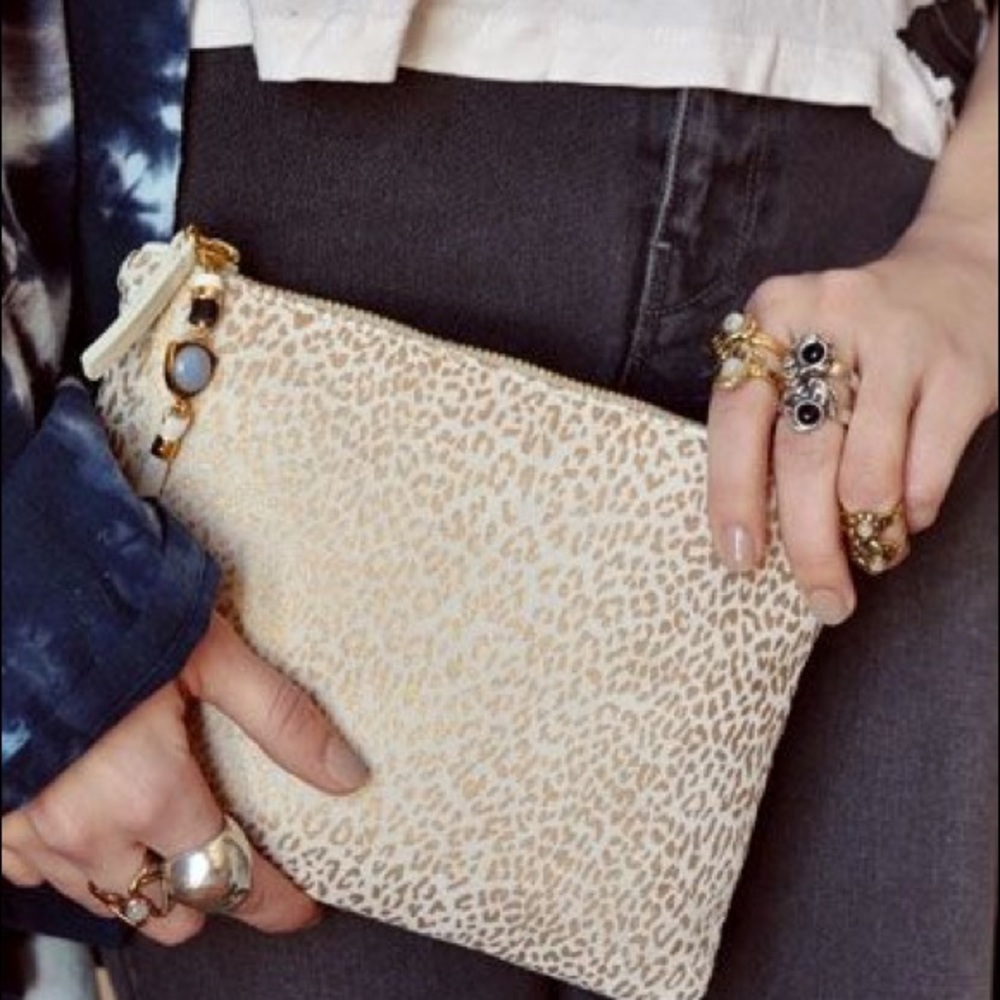 Lizzie Fortunato gold leopard “Front Row” clutch